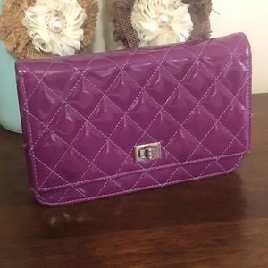Sold. Chanel Reissue purple WOC